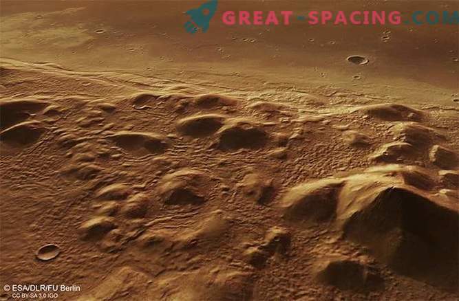 Lód może być ukryty pod wzgórzami Marsa